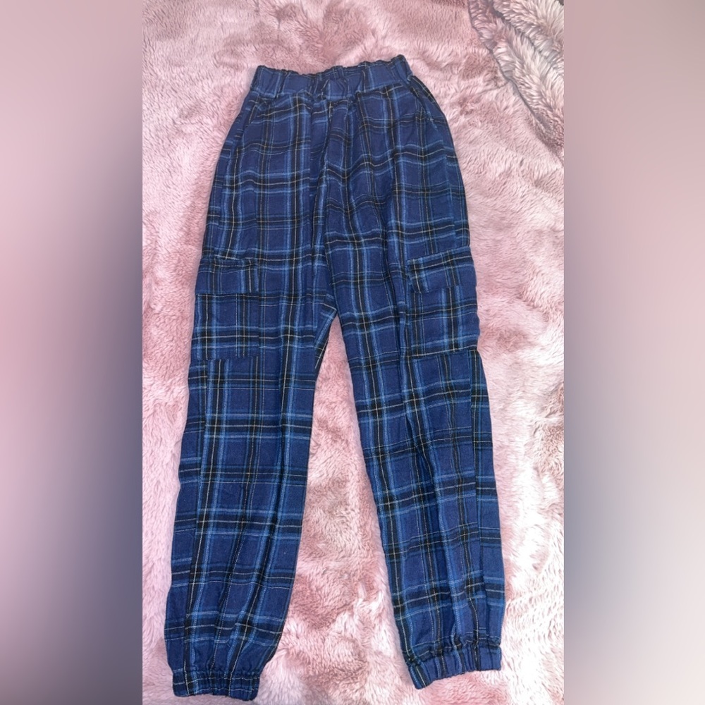 Blue plaid sweatpants.